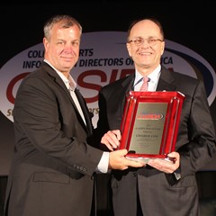 Charlie Fiss (Goodyear Cotton Bowl) accepted his CoSIDA Hall of Fame Award.